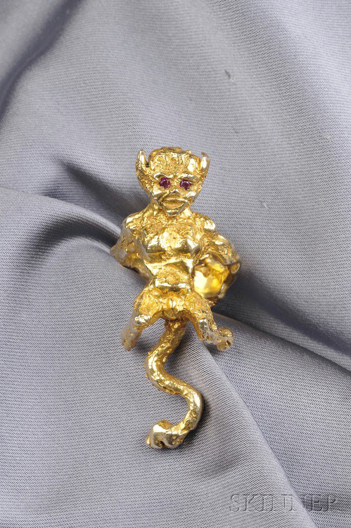 Sold at Auction: HERMES 14K GOLD SCARF RING.