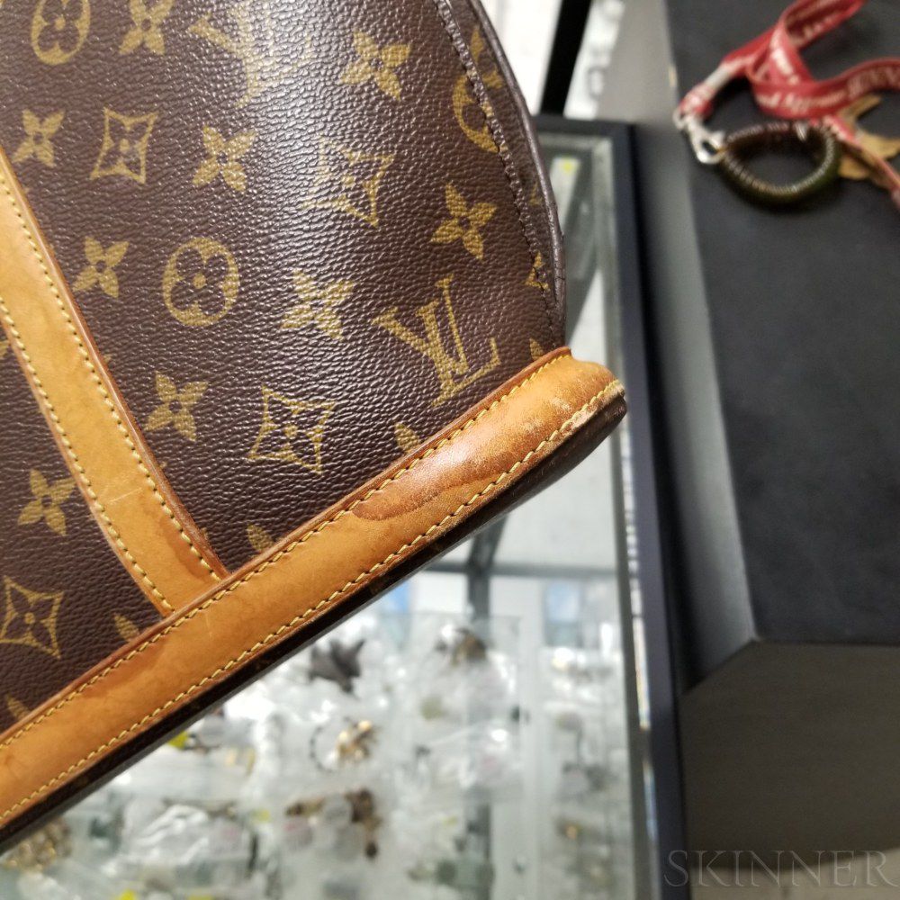 Sold at Auction: LOUIS VUITTON BABYLONE