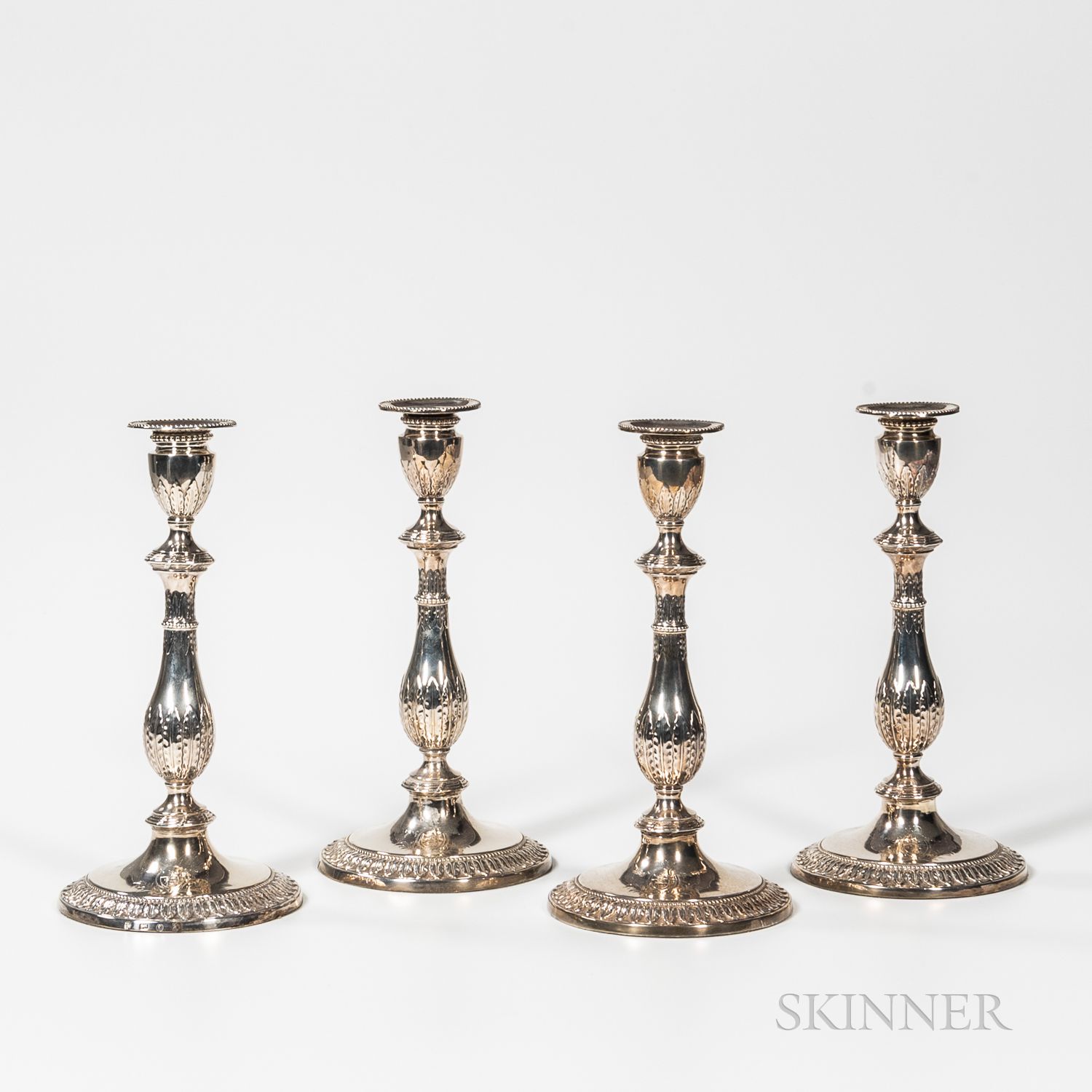 Sold At Auction Four Georgian London Sterling Silver Candlesticks