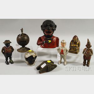 Seven Painted Cast Iron Figural Still Banks and a Jolly N. Painted Cast Iron Mechanical Bank.