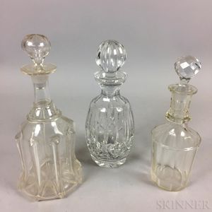 Three Colorless Glass Decanters