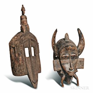 Senufo-style and a Dogon-style Carved Masks