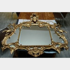 Italian Rococo-style Carved Giltwood Tri-Part Overmantel Mirror.