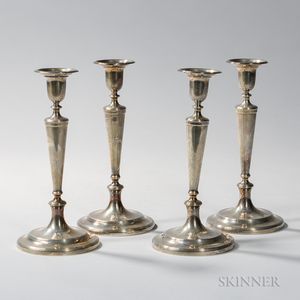 Four Tiffany & Co. Sterling Silver Candlesticks