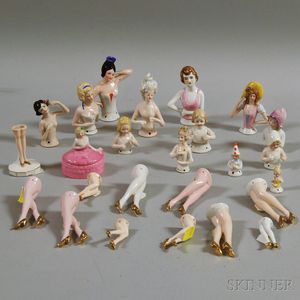 Twenty-four Porcelain Half Dolls and a Figural Box