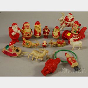 Thirteen Assorted Vintage Celluloid Santa Claus Figural Christmas Decorations