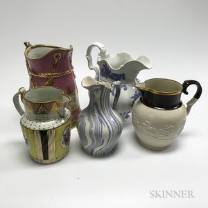Ten Staffordshire Ceramic Pitchers
