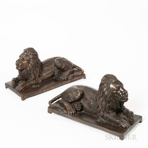 Pair of Bronze Recumbent Lions