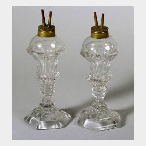 Pair of Colorless Pressed Ellipse Fluid Lamps