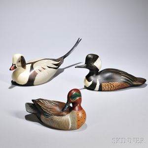 Three Duck Decoys, Big Sky Carvers, Montana, late 20th/early 21st century, with glass eyes and detailed paint, comprising a Long-tailed