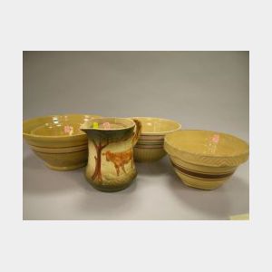 Four Yellowware Bowls and a Pitcher.