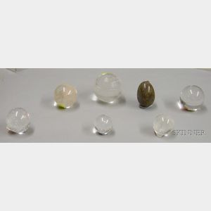 Six Colorless Crystal Hardstone Spheres and a Colored Egg