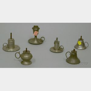Six Small Pewter Hand Lamps