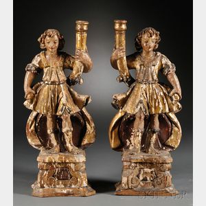 Pair of Figural Carved, Polychrome, and Giltwood Candlesticks