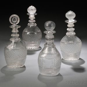 Four Blown Three-mold Colorless Glass Decanters with Stoppers