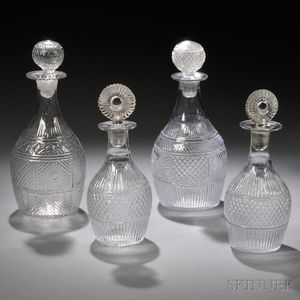 Four Blown Three-mold Colorless Glass Decanters with Stoppers