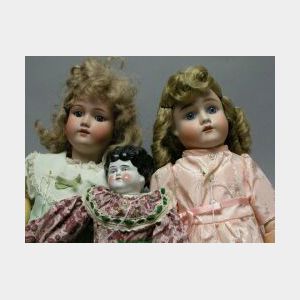 Two Bisque and One China Head Dolls