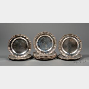 Set of Fourteen George III Silver Chargers
