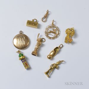 Seven Gold Figural Charms and an 18kt Gold Dog Brooch