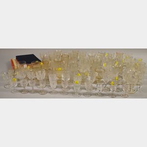 Collection of Sixty-five Colorless Pressed Pattern Glass Egg Cups