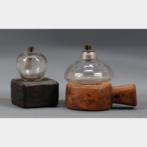 Two Glass Peg Lamps on Carved Wooden Bases