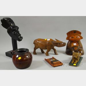 Four Ethnographic Wood Carvings, a Musical Instrument, and Glazed Stoneware Bean Pot.