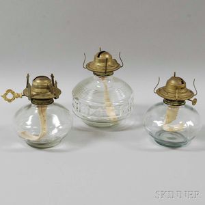 Three Colorless Glass Oil Lamps
