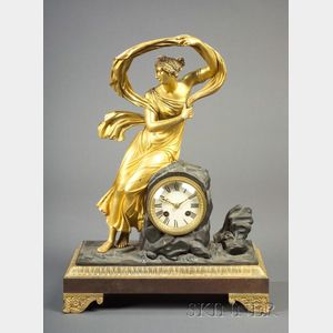 French Empire Revival Patinated and Gilt Bronze Figural Mantel Clock