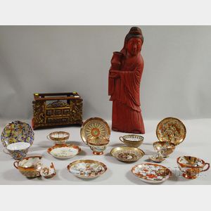 Asian Red-painted Carved Wood Guan Yin Figure and Seven Japanese Porcelain Cups and Saucers