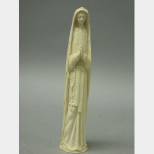 Carved Ivory Figure of a Nun Saint.