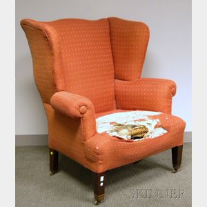 Chippendale-style Upholstered Mahogany Wing Chair.