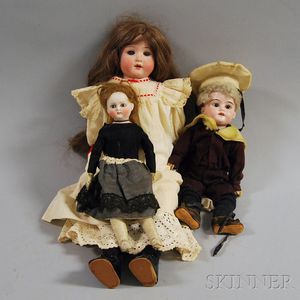 Three Small Dolls