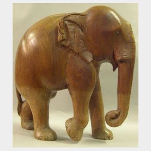 Asian Carved Hardwood Elephant with Inset Glass Bead Eyes.