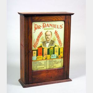 Dr. Daniels' Veterinary Medicines Lithographed Pressed Metal and Ash Retail Display Cabinet with Contents