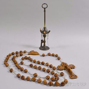 Glazed Rosary Beads and Cross and a Brass Oil Lamp
