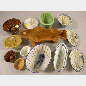 Thirteen Assorted Glazed and Cobalt Decorated Ceramic Culinary Molds