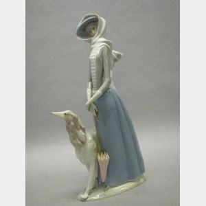 Lladro Porcelain Figure of a Lady Walking a Dog
