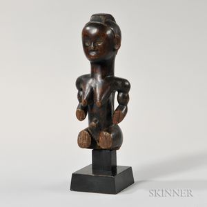 Fang Black Patinated Carved Wood Seated Female Figure