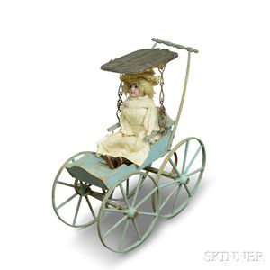 Painted Doll Carriage and a Bisque Shoulder Head Doll. 