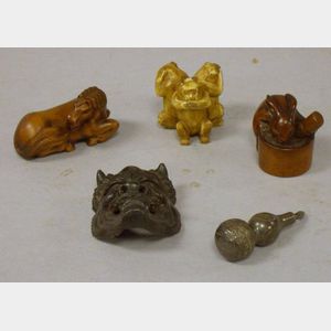 Two Japanese Carved Wood Netsukes and a Carved Ivory Netsuke, a Small Silver Gourd-form Netsuke, and a Small Cast Bronze Mask.