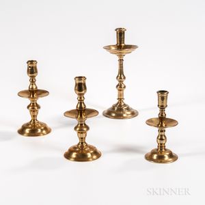 Four 18th Century European Brass Mid-drip Candlesticks