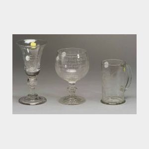Three Colorless Etched Glass Vessels