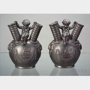 Pair of Wedgwood Black Basalt Figural Vases