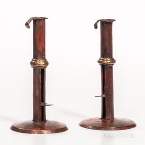 Two Red-painted Brass-banded Iron Hogscraper Candlesticks