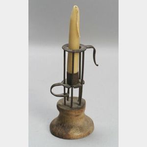 Iron Stable Candlestick on a Carved Wooden Base