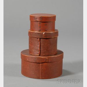 Three Small Round Red-painted Lapped-seam Covered Boxes