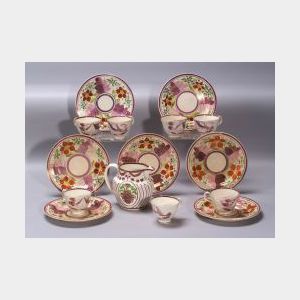 Nineteen Pink Lustre Decorated Earthenware Dishes