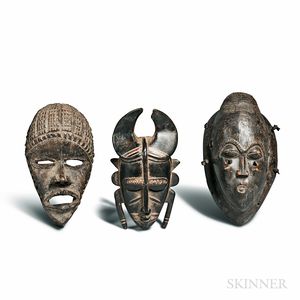 Three Carved Wood Masks