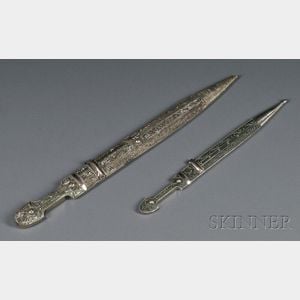 Two Silver-gilt and Nielloed Daggers
