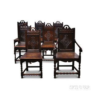 Assembled Set of Seven Carved Oak Chairs
